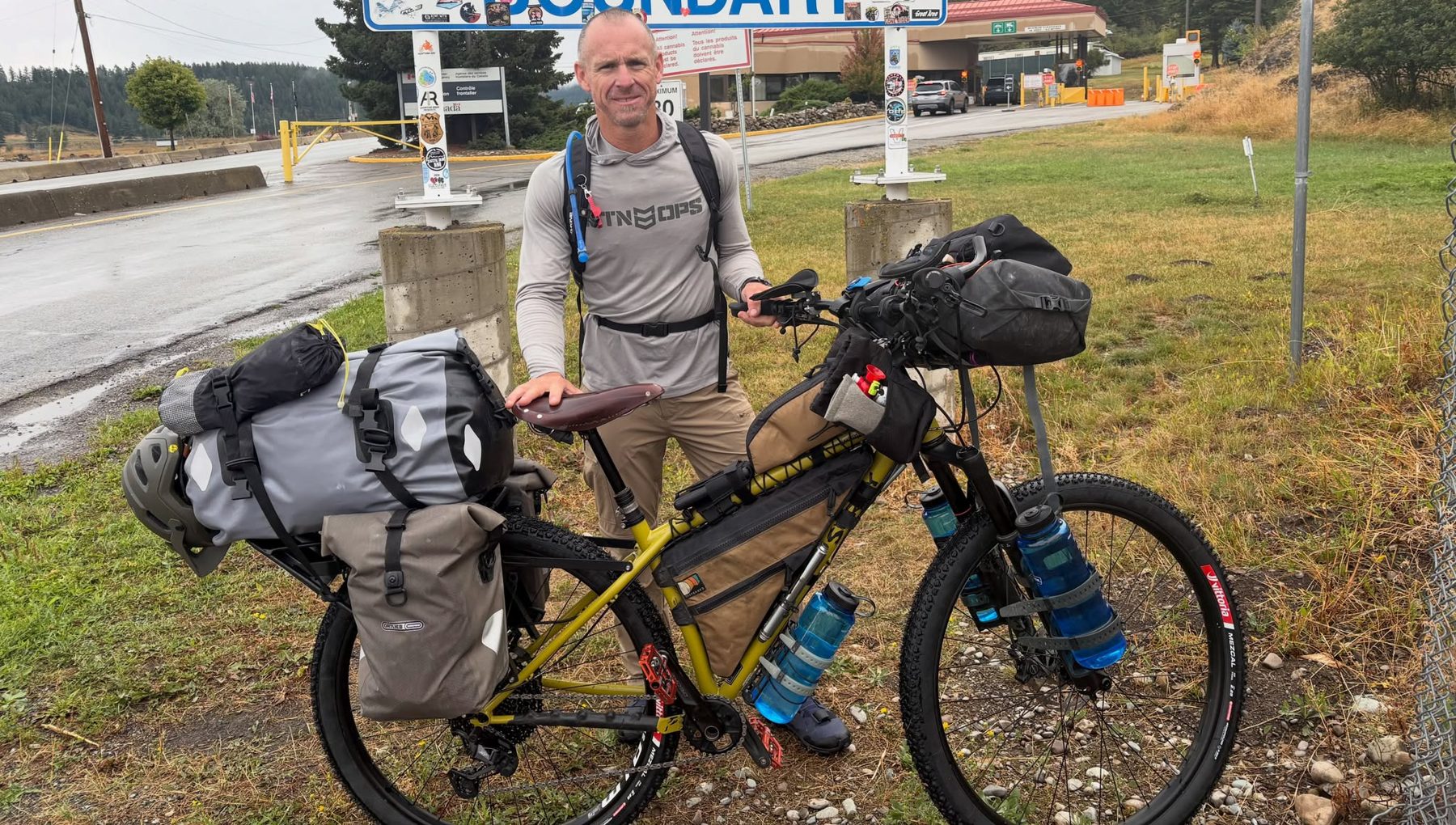 Rick Saunders with his loaded bike at the Roosville border crossing